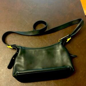 All leather genuine Coach purse . Used , slight wear , good shape !